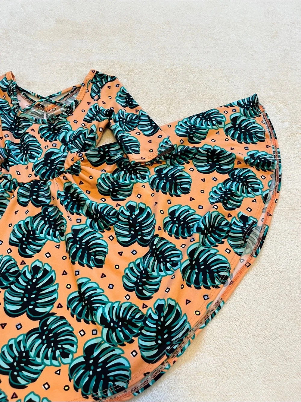 Dot Dot Smile | Little Girls Peach Monstera Leaf Dress 3/4